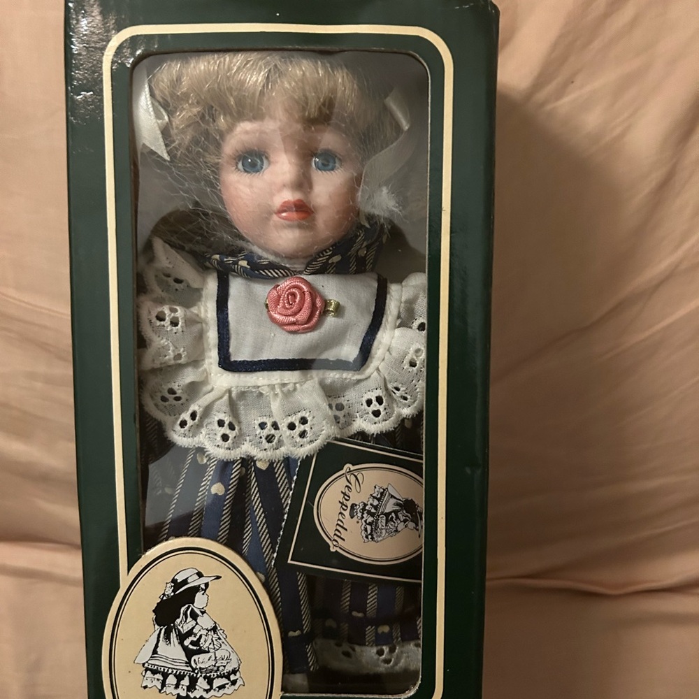 Vintage Geppeddo 8 1/2”Porcelain Doll Blue Dress Lace Trimmed ￼